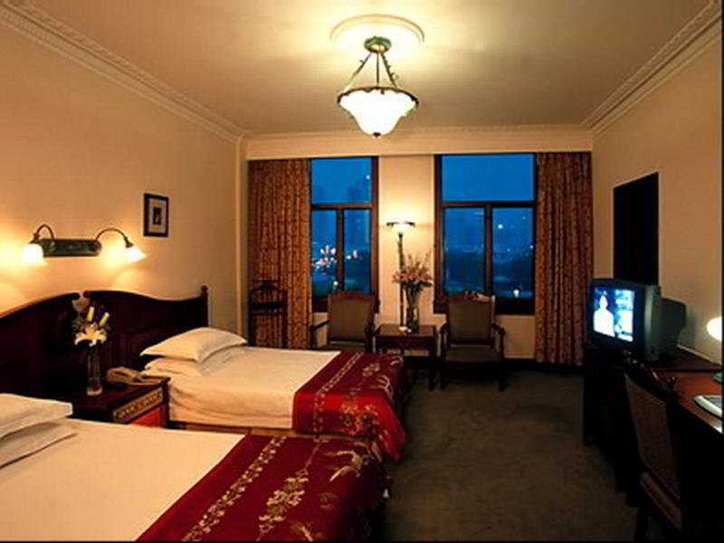 Jin Jiang Pacific Hotel Shanghái Habitación foto