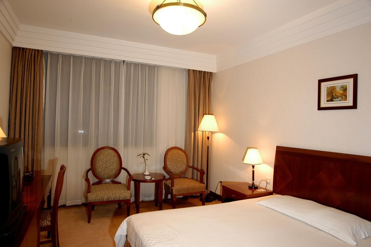 Jin Jiang Pacific Hotel Shanghái Habitación foto