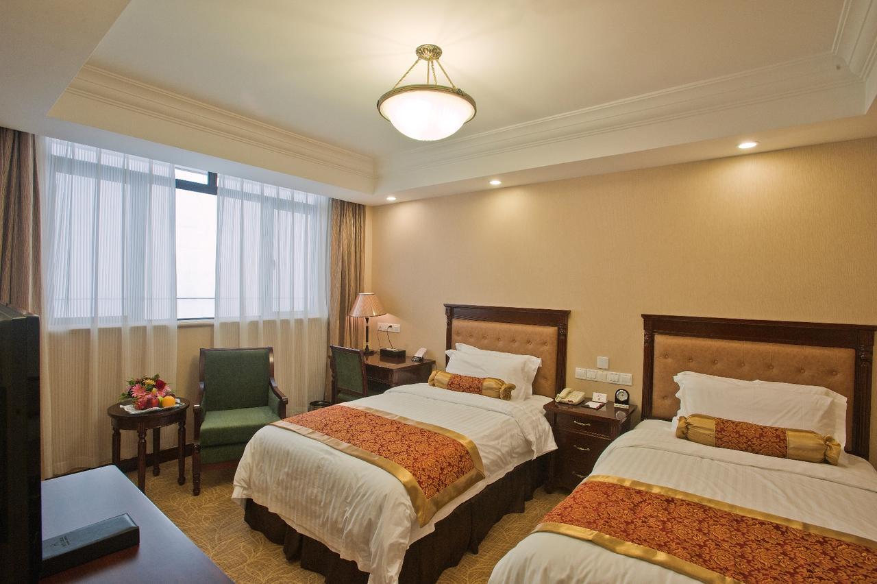 Jin Jiang Pacific Hotel Shanghái Habitación foto